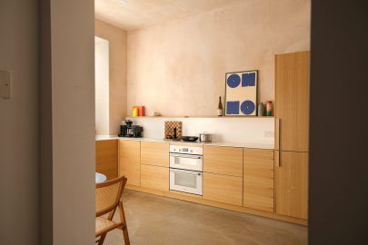picture of a kitchen made from Ikea carcasses and custom made cupboard doors, made from oak